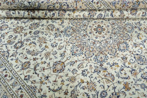 Close-up detail of 2000s Kashan rug from Iran / Persia showing Wool weave