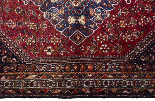 Full view of 2000s Shiraz rug from Iran / Persia, 215 × 151 cm in Red tones
