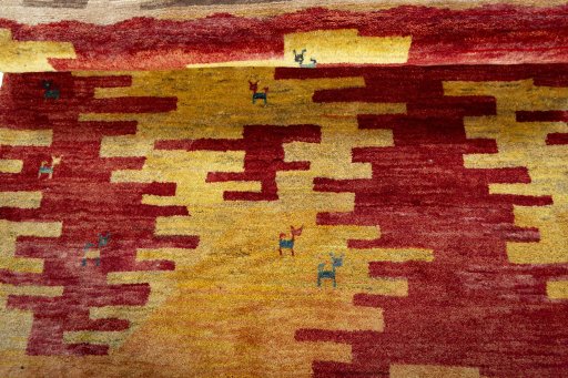 Full view of 2000s Persian Gabbeh rug from Pakistan, 170 × 118 cm in Multi Color tones