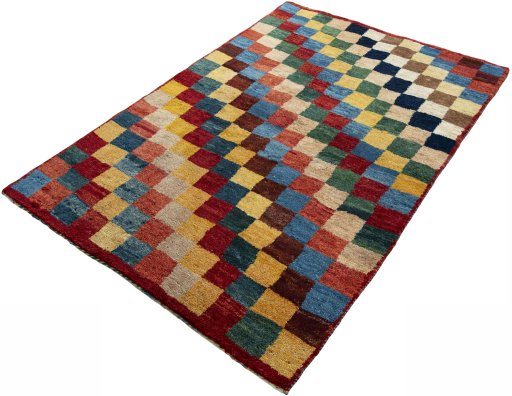 Corner detail of 2000s Persian Gabbeh rug showing border pattern and Wool pile