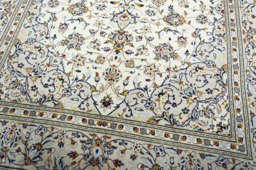 Close-up detail of 2000s Kashan rug from Iran / Persia showing Wool weave