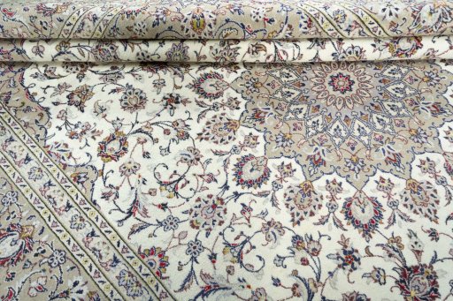 Close-up detail of 2000s Kashan rug from Iran / Persia showing Wool weave