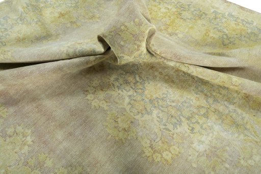 Surface texture of 1970s Vintage rug with natural Wool and intricate pattern
