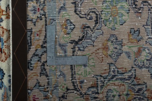 Backside of handmade 2000s Yazd rug showing knot structure and weave density