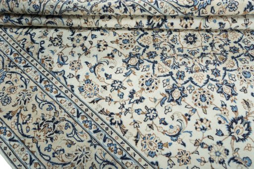Close-up detail of 2000s Kashan rug from Iran / Persia showing Wool weave