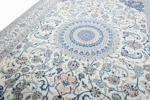 Backside of handmade 2000s Nain rug showing knot structure and weave density