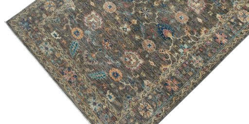 Backside of handmade New Farahan rug showing knot structure and weave density