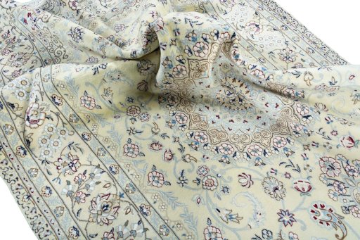 Surface texture of 2000s Nain rug with natural Wool and intricate pattern