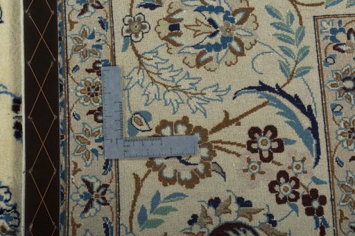 Backside of handmade 2000s Nain rug showing knot structure and weave density