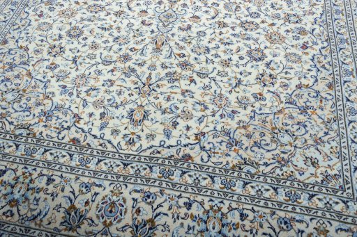 Close-up detail of 2000s Kashan rug from Iran / Persia showing Wool weave