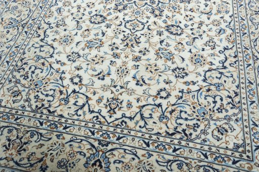 Close-up detail of 2000s Kashan rug from Iran / Persia showing Wool weave