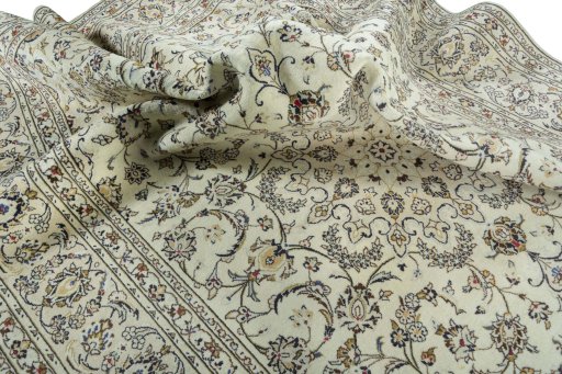Surface texture of 2000s Kashan rug with natural Wool and intricate pattern