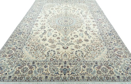 Surface texture of 2000s Nain rug with natural Wool and intricate pattern