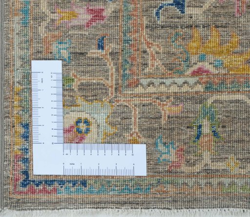 Corner detail of New Kazak rug showing border pattern and Wool pile