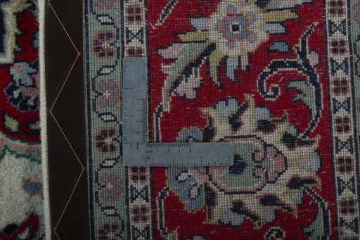Backside of handmade 2000s Sarough rug showing knot structure and weave density