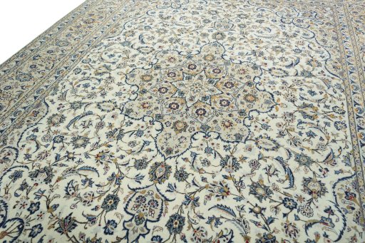 Backside of handmade 2000s Kashan rug showing knot structure and weave density