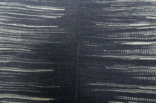 Backside of handmade New Kilim Kiasar rug showing knot structure and weave density