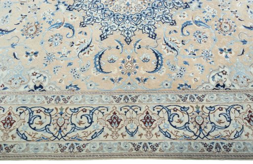 Corner detail of 2000s Nain rug showing border pattern and Wool pile