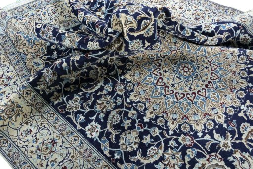 Surface texture of New Nain rug with natural Wool and intricate pattern