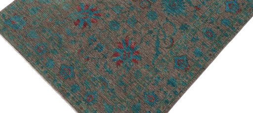 Backside of handmade New Farahan rug showing knot structure and weave density
