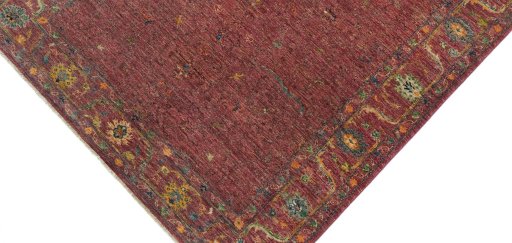 Backside of handmade New Farahan rug showing knot structure and weave density