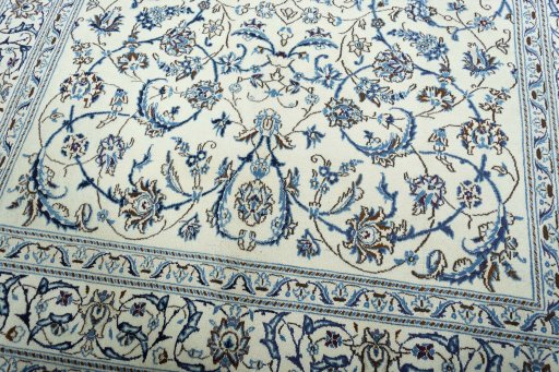 Close-up detail of 2000s Nain rug from Iran / Persia showing Wool weave