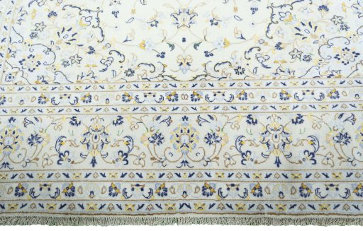 Close-up detail of 2000s Kashan rug from Iran / Persia showing Wool weave