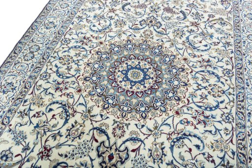Backside of handmade 2000s Nain rug showing knot structure and weave density