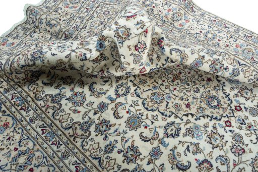 Surface texture of 2000s Kashan rug with natural Wool and intricate pattern