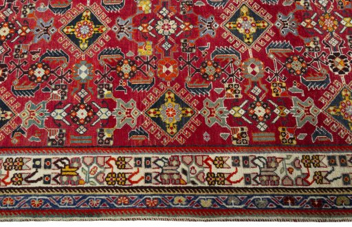 Close-up detail of 2000s Shiraz rug from Iran / Persia showing Wool weave
