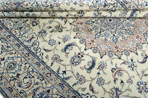 Close-up detail of 2000s Nain rug from Iran / Persia showing Wool weave