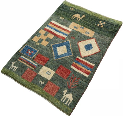 Corner detail of 2000s Persian Gabbeh rug showing border pattern and Wool pile
