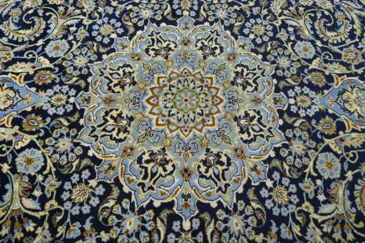 Central medallion detail of New Kashan rug from Iran / Persia