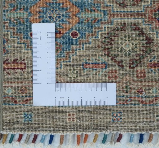 Corner detail of New Samarkand rug showing border pattern and Wool pile