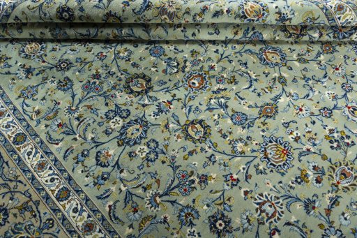 Close-up detail of 2000s Kashan rug from Iran / Persia showing Wool weave