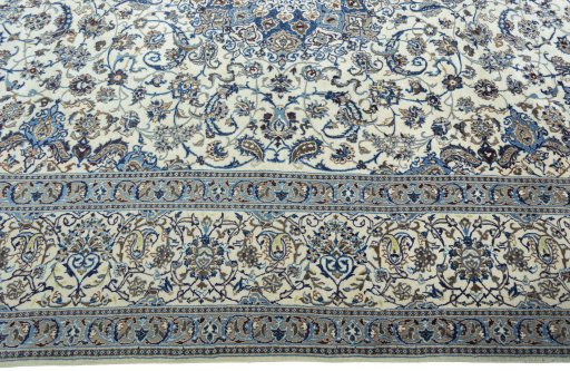 Corner detail of 2000s Nain rug showing border pattern and Wool pile