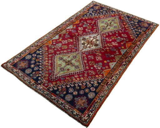 Corner detail of 2000s Shiraz rug showing border pattern and Wool pile