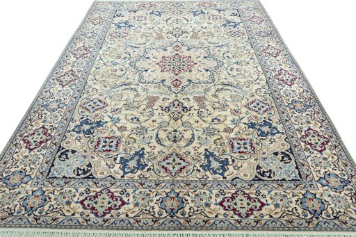 Surface texture of 2000s Nain rug with natural Wool and intricate pattern