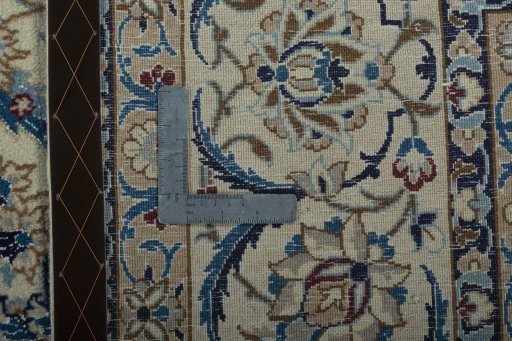 Backside of handmade 2000s Nain rug showing knot structure and weave density