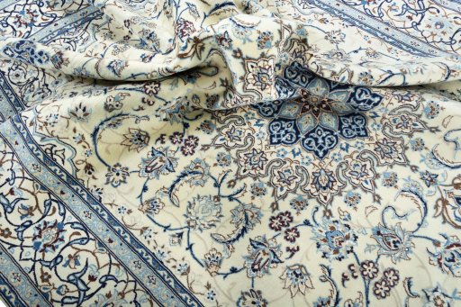 Surface texture of New Nain rug with natural Wool and intricate pattern