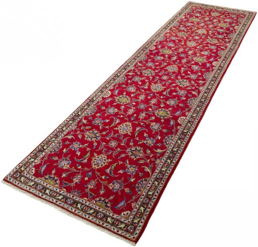 Corner detail of 2000s Kashan rug showing border pattern and Wool pile