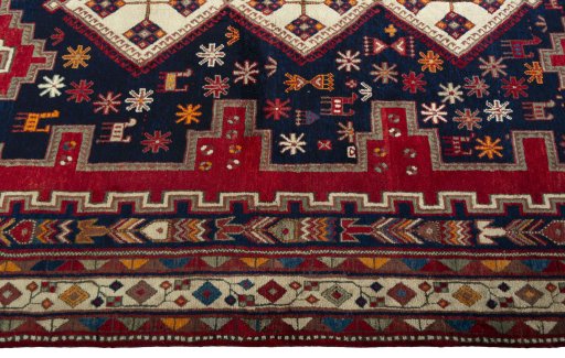 Close-up detail of 2000s Sirjan rug from Iran / Persia showing Wool weave
