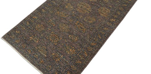 Backside of handmade New Farahan rug showing knot structure and weave density