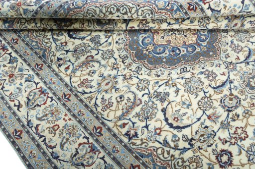 Close-up detail of 2000s Nain rug from Iran / Persia showing Wool weave