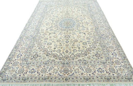 Surface texture of 2000s Nain rug with natural Wool and intricate pattern