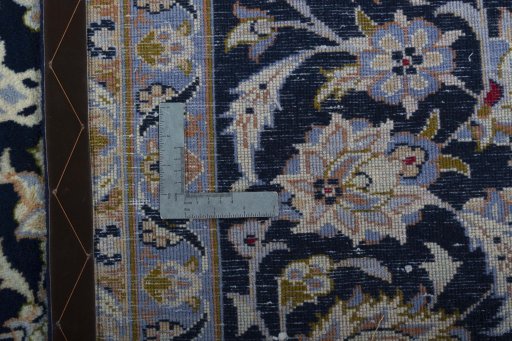 Backside of handmade 2000s Najafabad rug showing knot structure and weave density