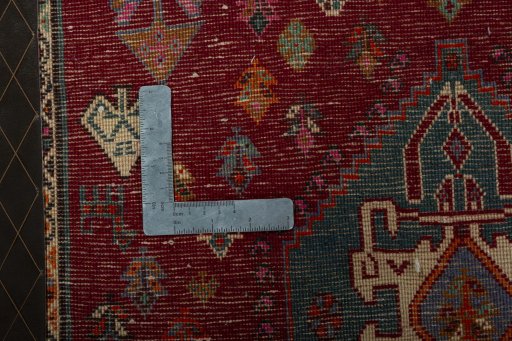 Backside of handmade 2000s Shiraz rug showing knot structure and weave density