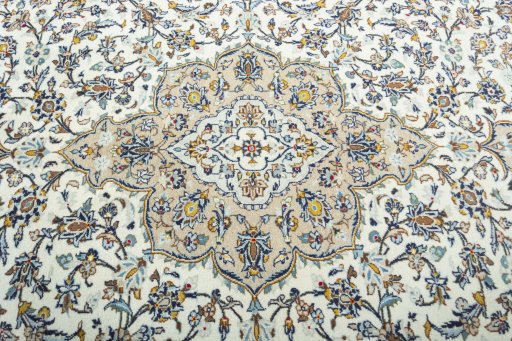 Central medallion detail of 2000s Kashan rug from Iran / Persia