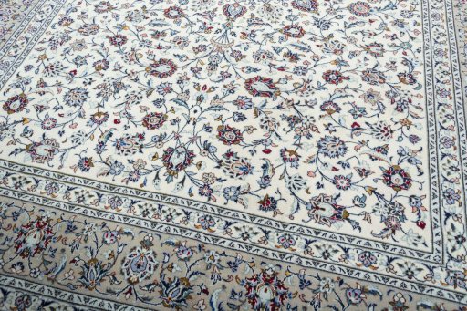 Close-up detail of 2000s Kashan rug from Iran / Persia showing Wool weave