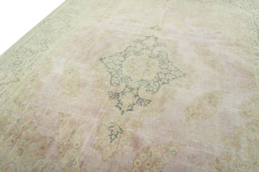 Backside of handmade 1950s Vintage rug showing knot structure and weave density